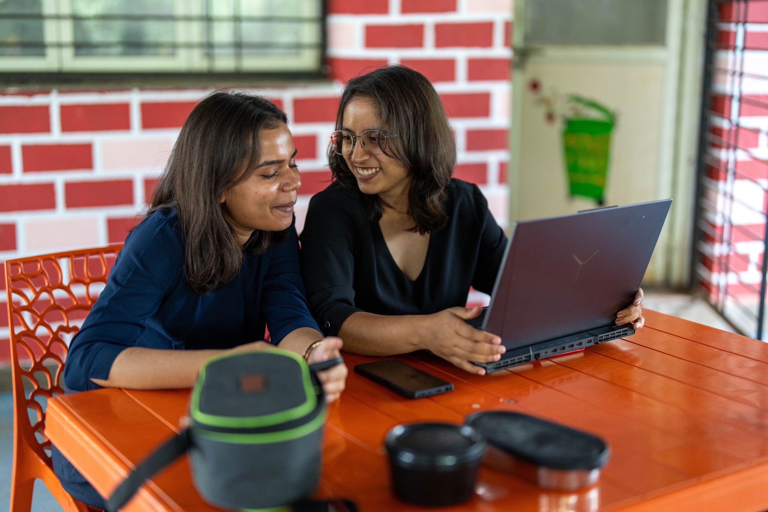 A shared table, a laptop and a new idea
