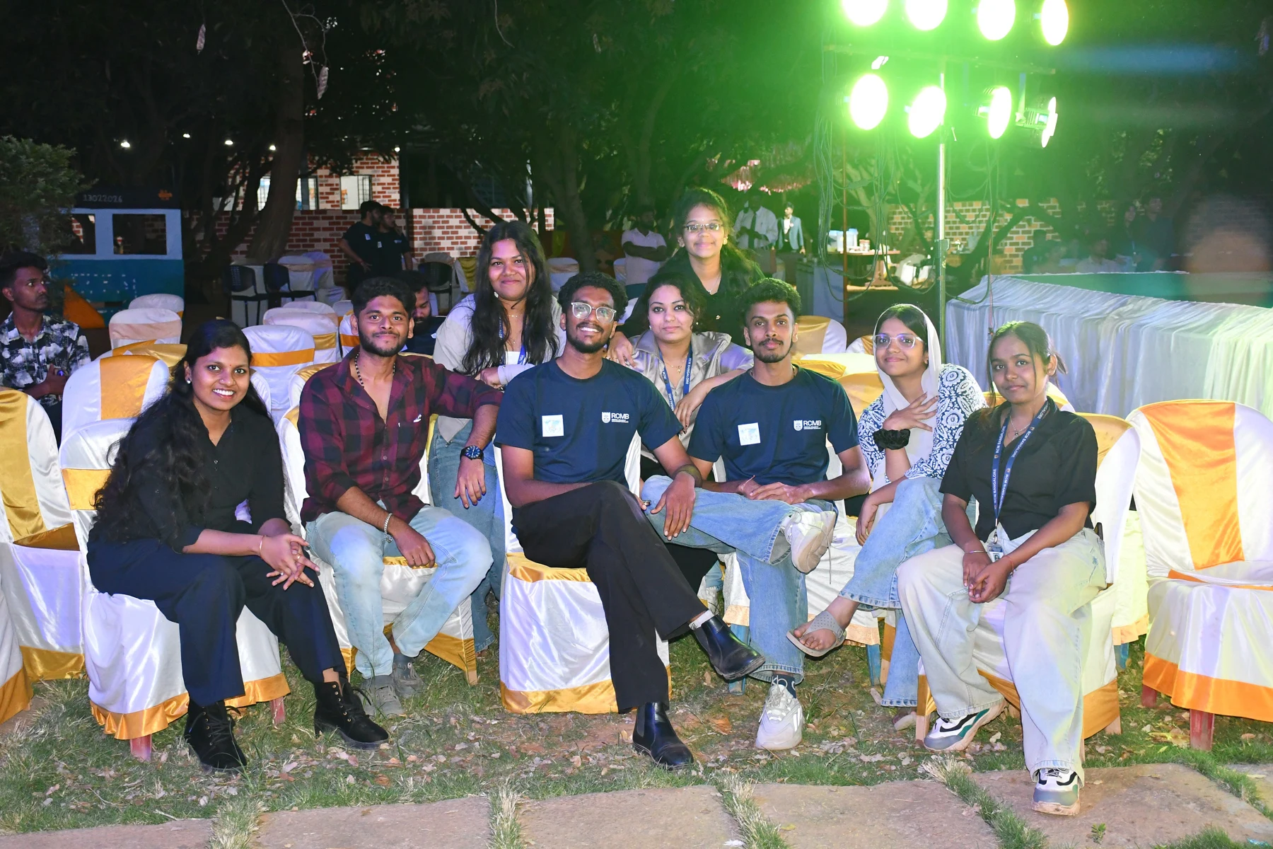 RCMB students sharing an evening campus celebration